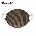 Cast iron reversible round griddle pan with folding handle